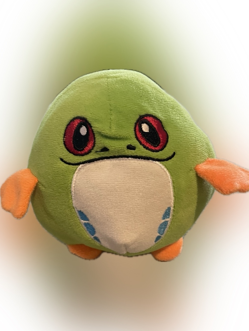 Nanco Jungle Eggamals Green Frog Plush
- Soft Round Plush with Orange Accents